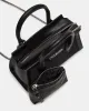 PEACHY BAG BLACK sold by Steve Madden