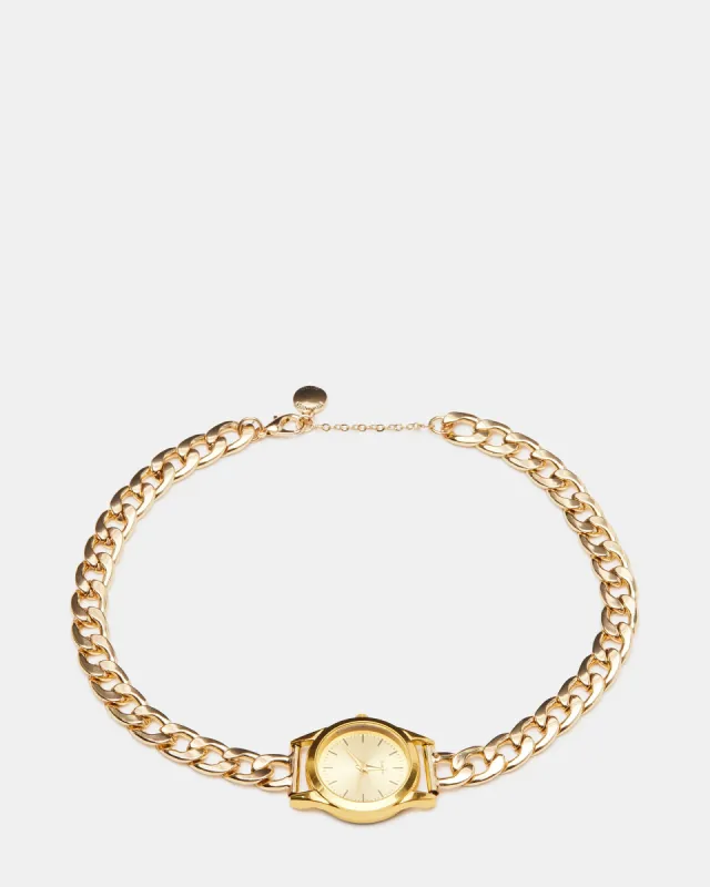 WATCH NECKLACE GOLD sold by Steve Madden
