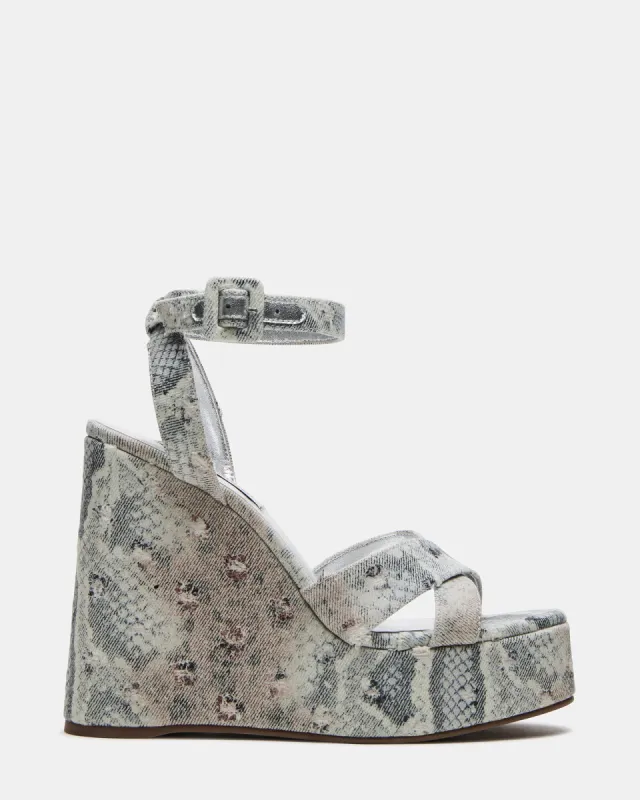 PINNACLE MULTI SNAKE sold by Steve Madden