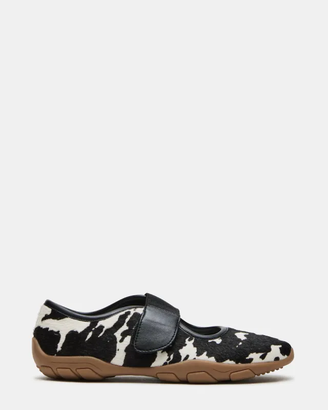 SCOOTER BLACK COW PRINT sold by Steve Madden