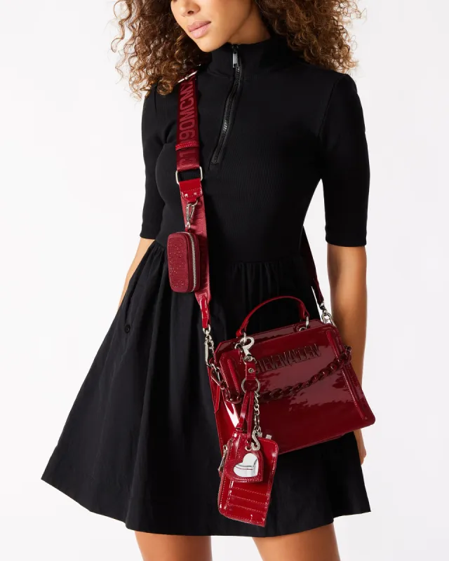 EVELYN BAG AND AMORE BAG CHARM BURGUNDY BUNDLE sold by Steve Madden