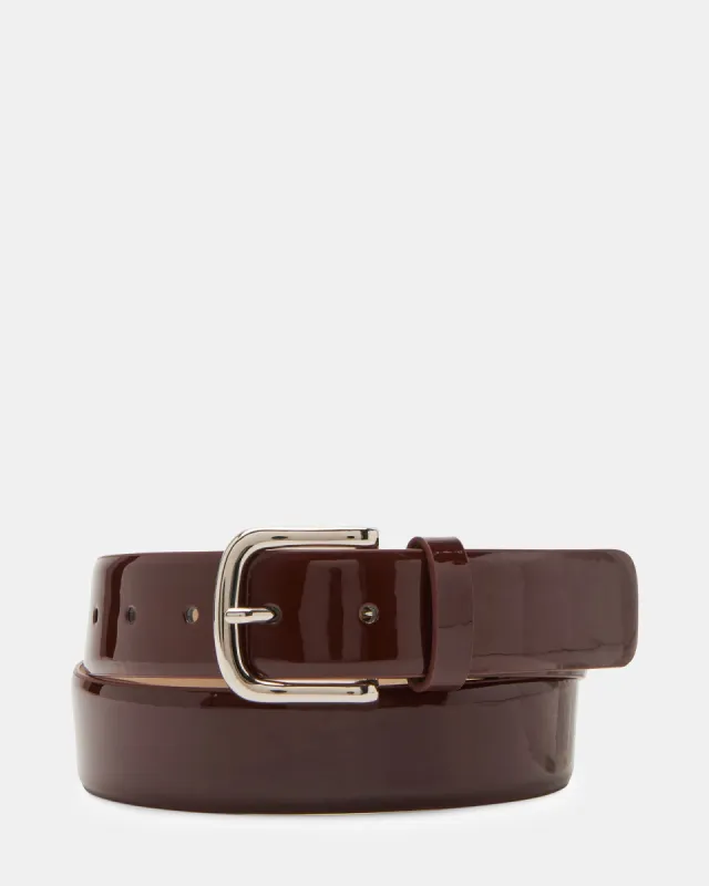CLASSIC PATENT BELT WINE sold by Steve Madden
