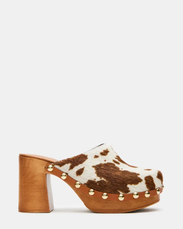 DUTTON TAN COW PRINT sold by Steve Madden