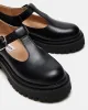 LUCIE BLACK LEATHER sold by Steve Madden
