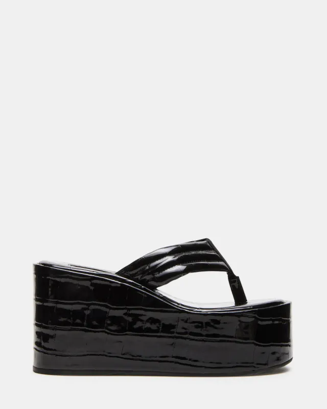 ESCAPISM BLACK CROCODILE sold by Steve Madden
