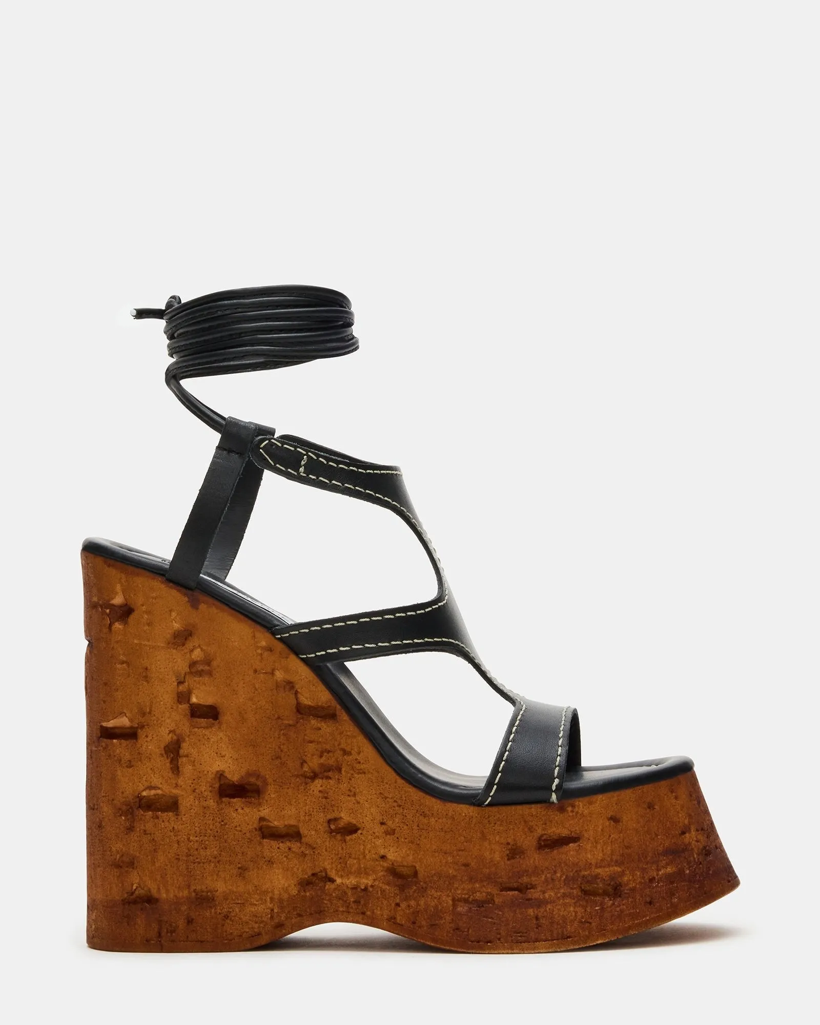 WHIMSY BLACK LEATHER sold by Steve Madden