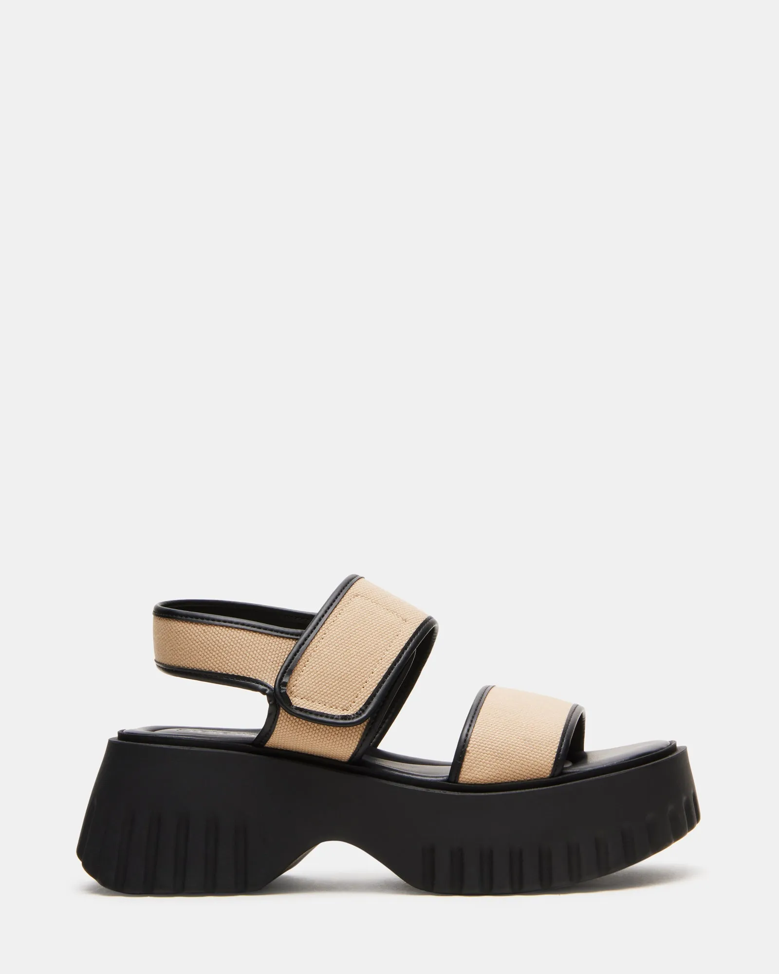 GROVER BLACK/TAN sold by Steve Madden