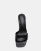 CURCIO BLACK CROCODILE sold by Steve Madden