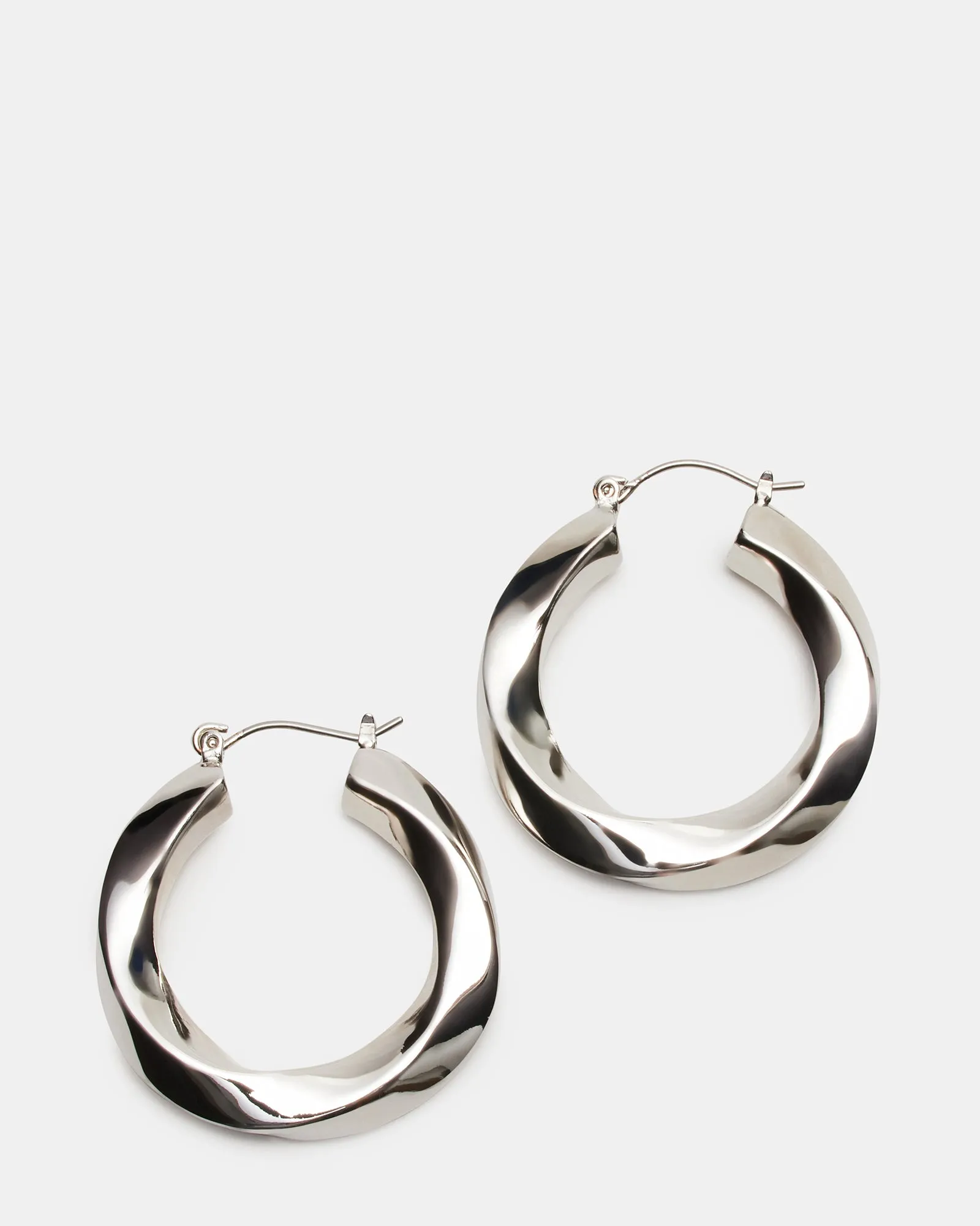 MEDIUM TWISTED HOOPS SILVER sold by Steve Madden