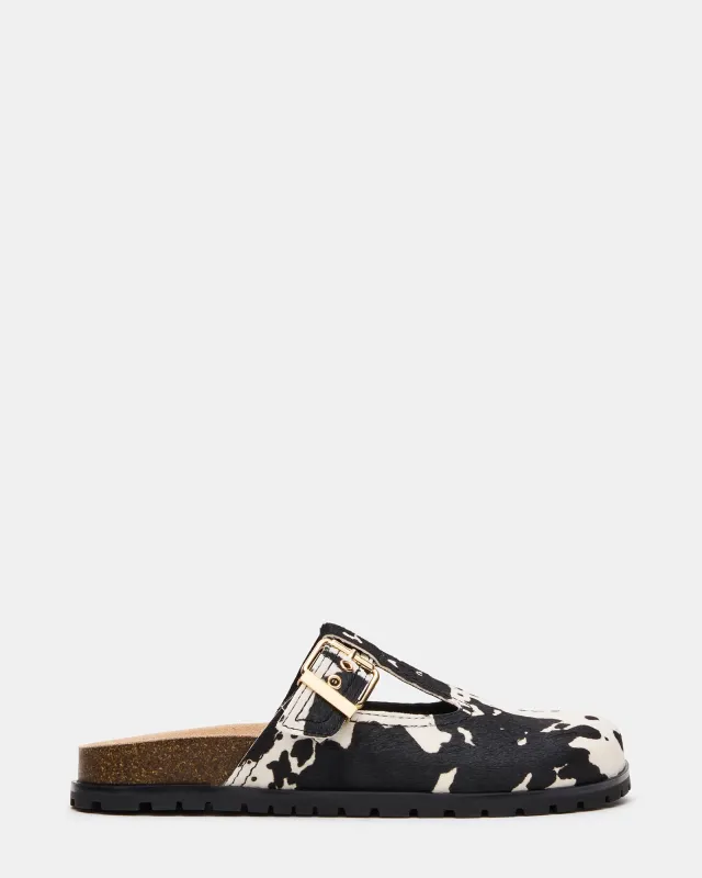 ATTICUS BLACK COW PRINT sold by Steve Madden