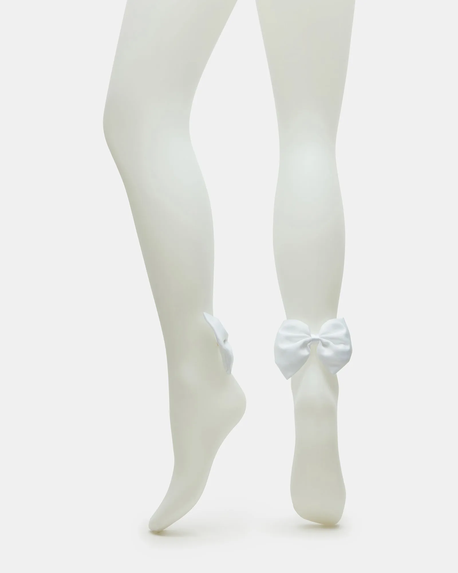 BRIDAL BOW TIGHTS SHEER WHITE sold by Steve Madden