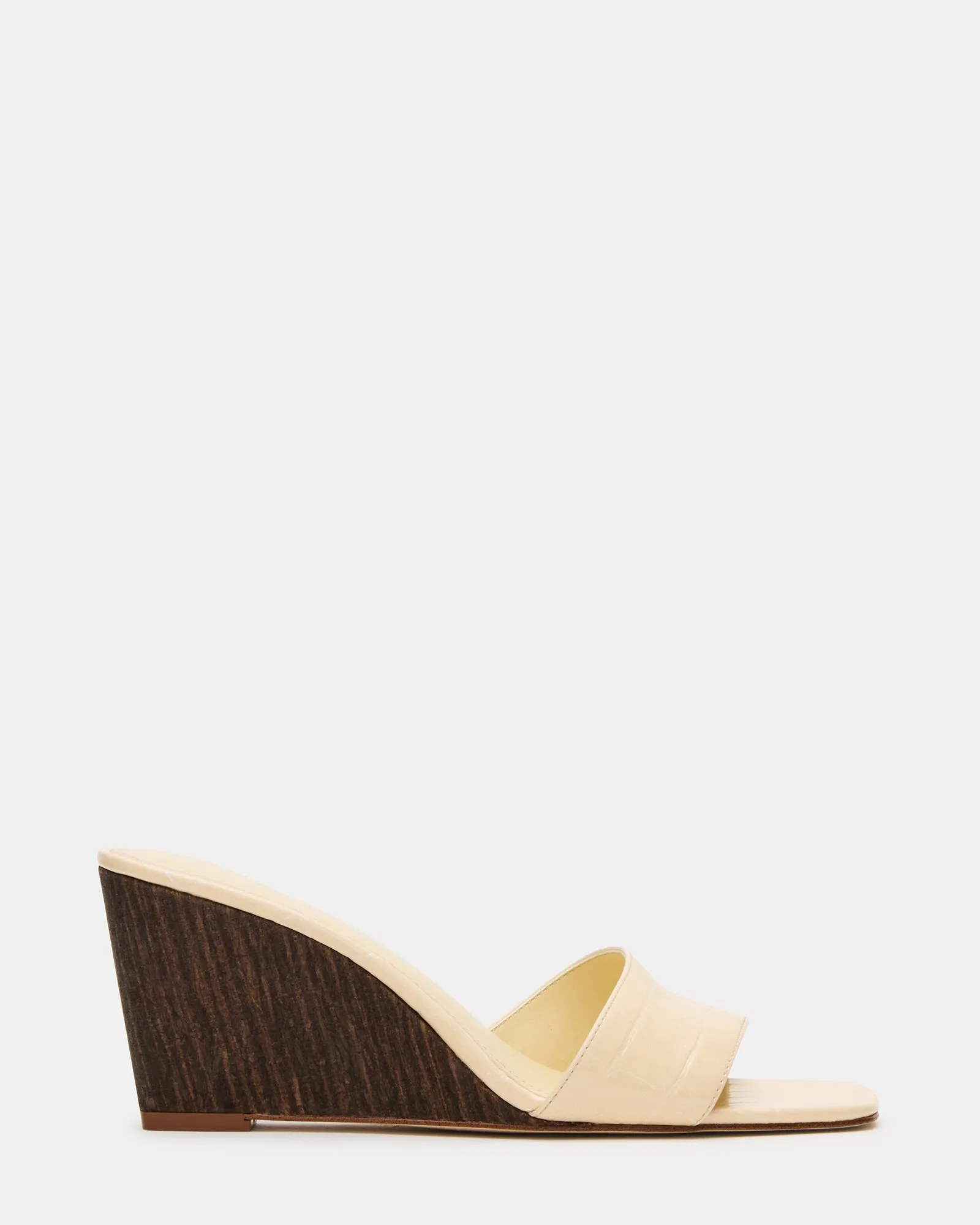 CURCIO BEIGE CROCODILE sold by Steve Madden