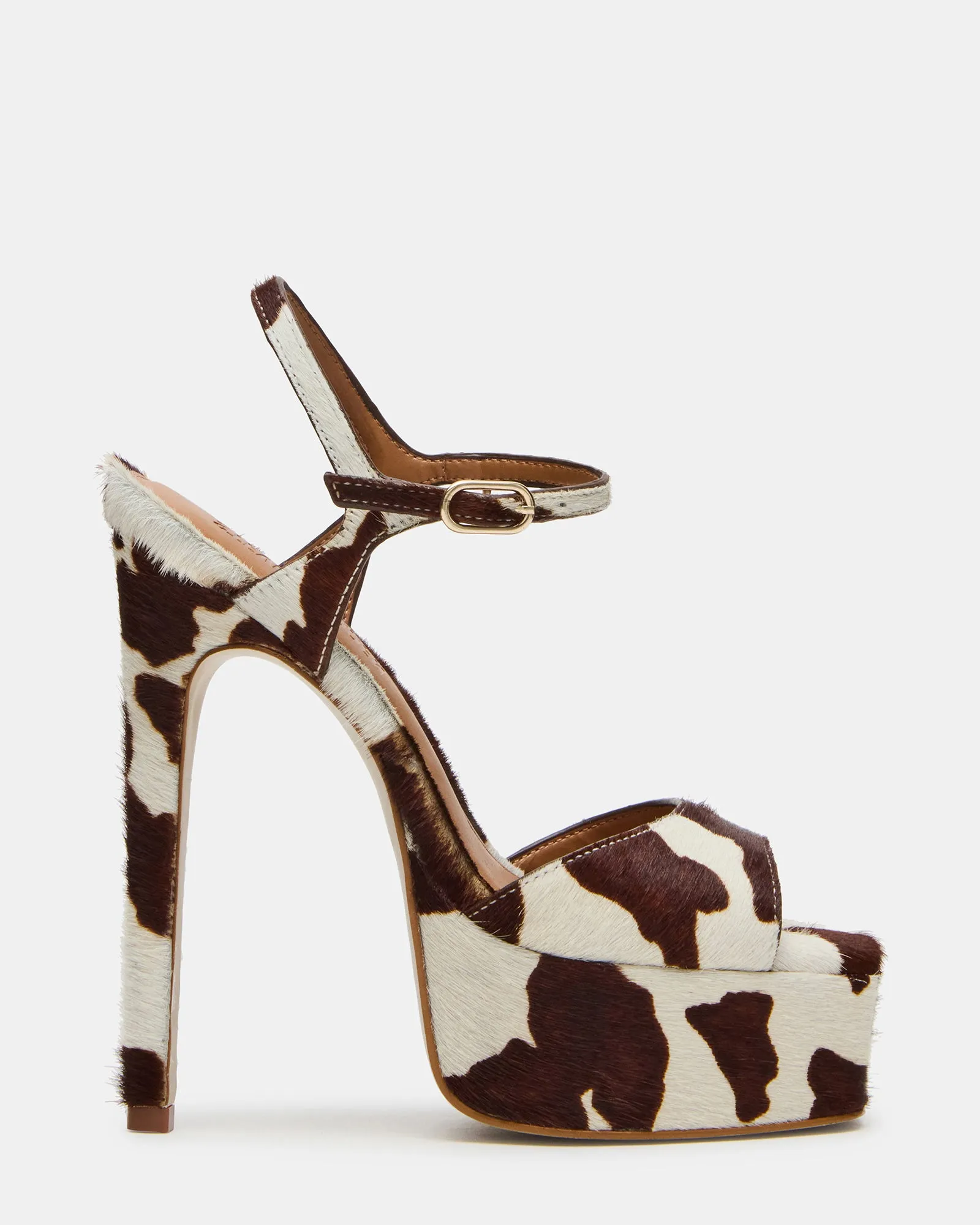 COLOGNE BROWN COW PRINT sold by Steve Madden