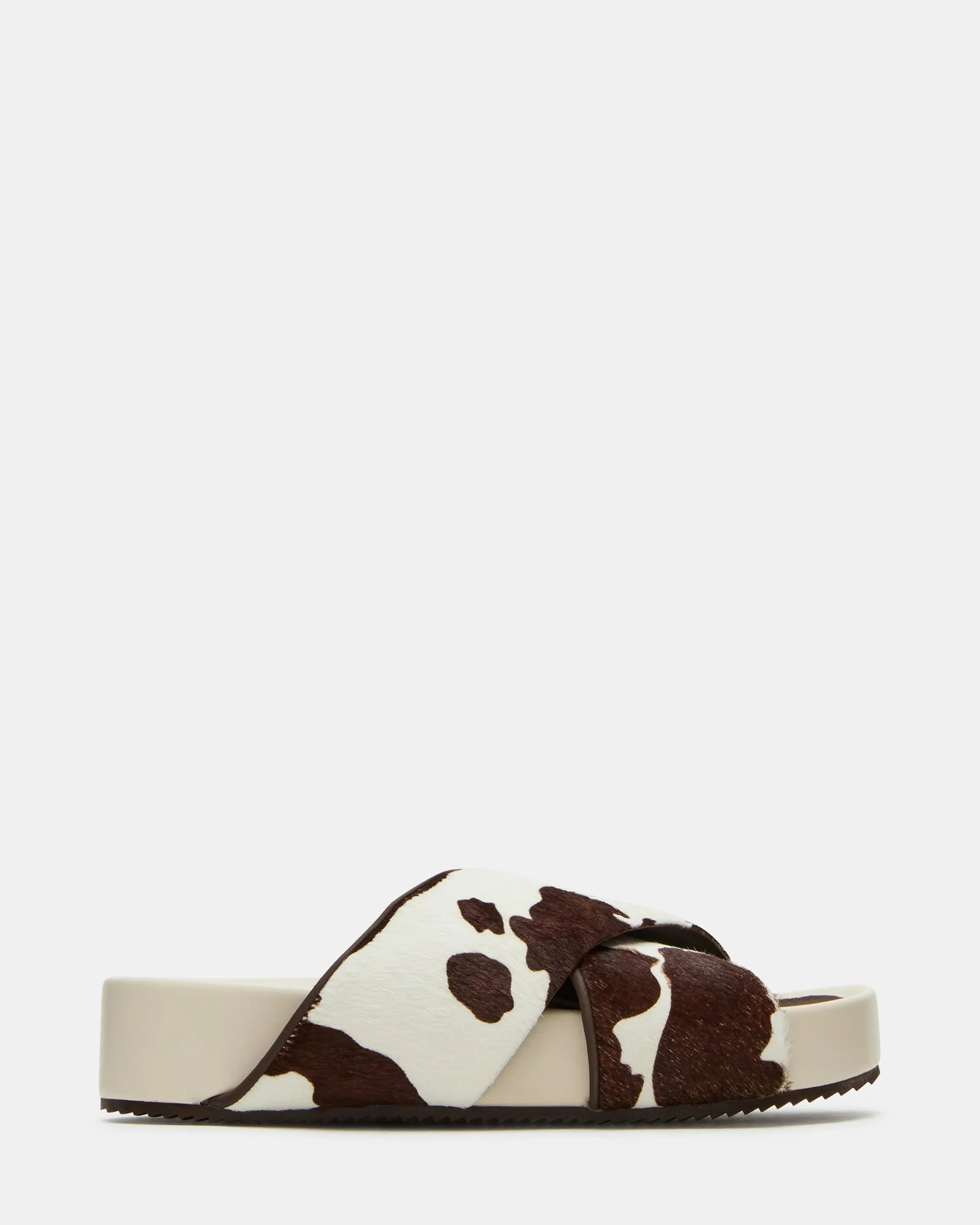 AVENDRA BROWN COW PRINT sold by Steve Madden