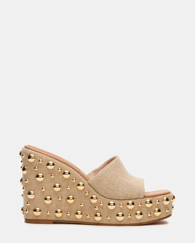 CAYMAN NATURAL MULTI STUDS sold by Steve Madden