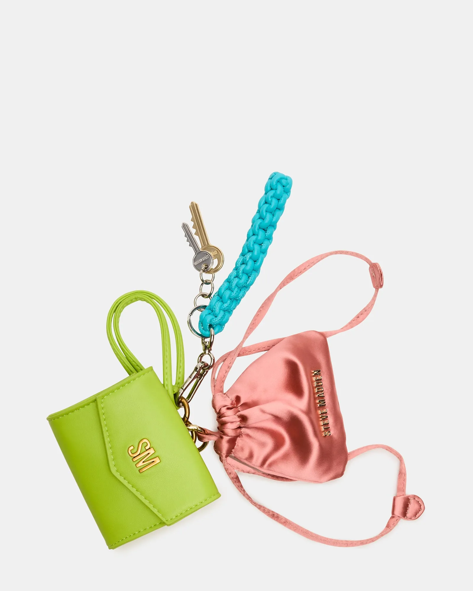 TRAVEL BAG CHARM GREEN MULTI sold by Steve Madden