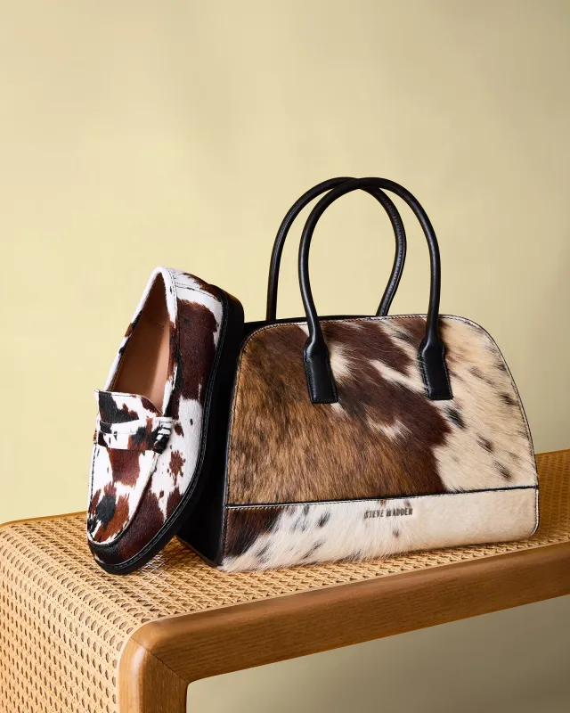 MADISON LOAFER AND HADLEE BAG COW PRINT BUNDLE sold by Steve Madden
