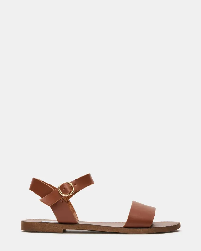 DONDDI TAN LEATHER - SM REBOOTED sold by Steve Madden