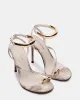 TIA BEIGE SNAKE sold by Steve Madden