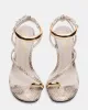 TIA BEIGE SNAKE sold by Steve Madden