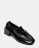 ESTEE BLACK CRINKLE PATENT sold by Steve Madden
