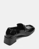 ESTEE BLACK CRINKLE PATENT sold by Steve Madden