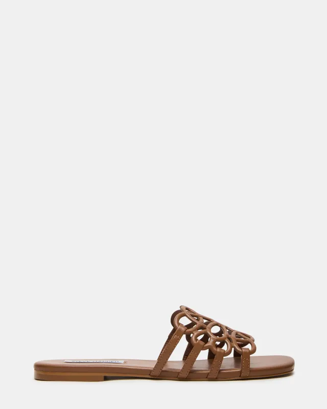 LOTUS TAN sold by Steve Madden