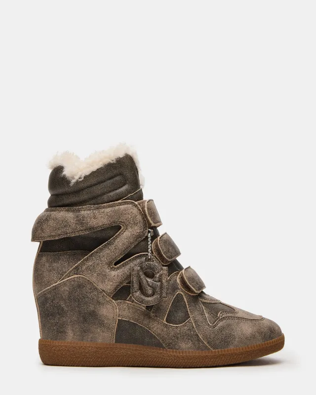 MAVIS FAUX FUR BROWN DISTRESSED sold by Steve Madden