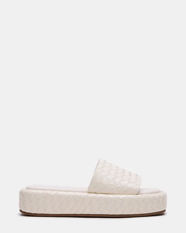 BEACHY QUILTED BONE sold by Steve Madden