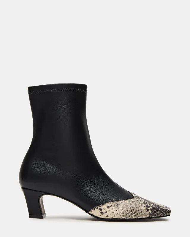 JETER BLACK SNAKE sold by Steve Madden