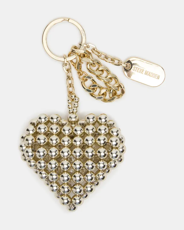 HEART BAG CHARM PEARL sold by Steve Madden