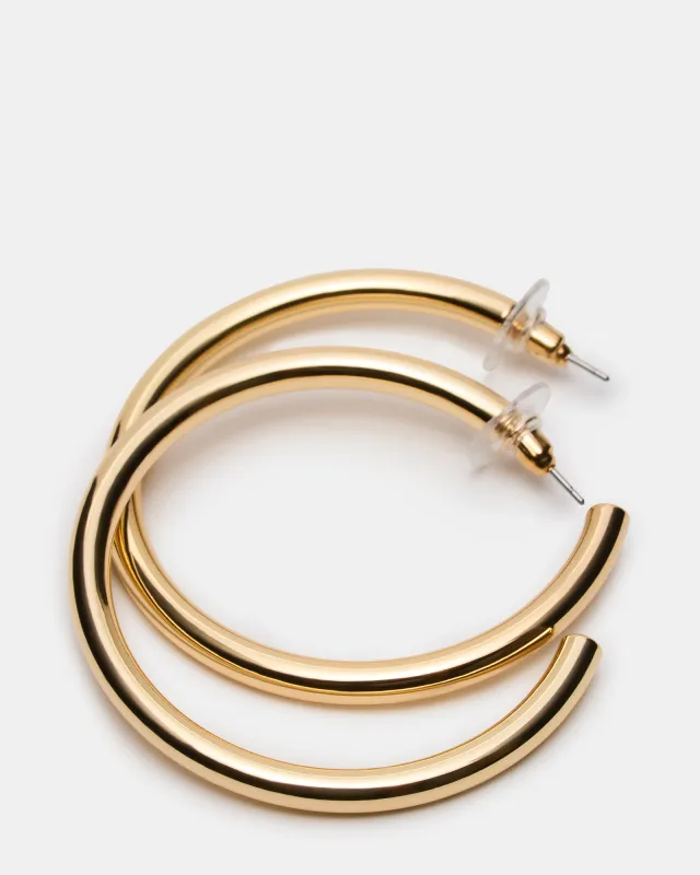 SKINNY HOOP EARRING GOLD sold by Steve Madden