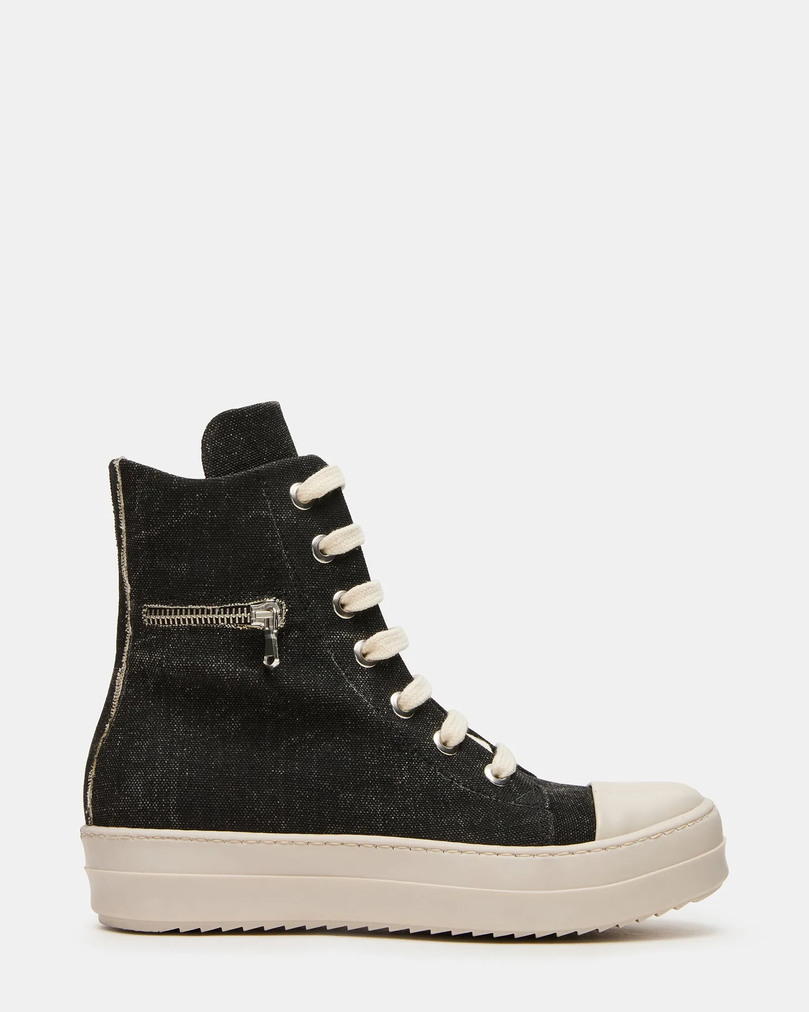 DEVON BLACK/WHITE sold by Steve Madden