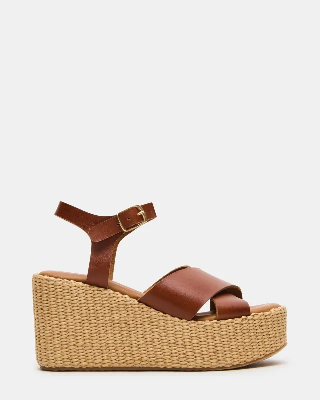 JETSET COGNAC LEATHER sold by Steve Madden