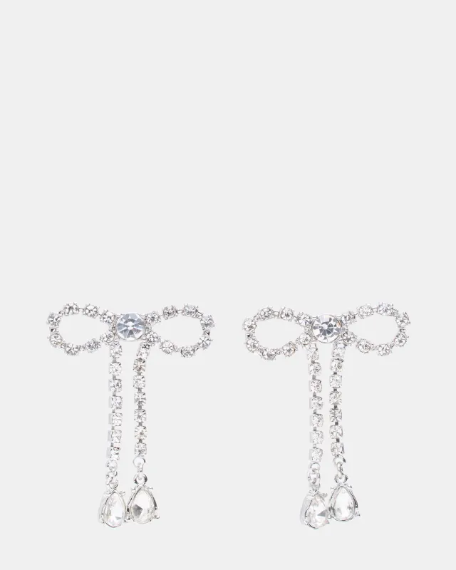 RHINESTONE BOW EARRINGS SILVER sold by Steve Madden