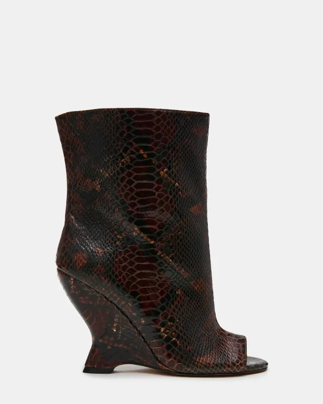 RYLIX BROWN SNAKE sold by Steve Madden