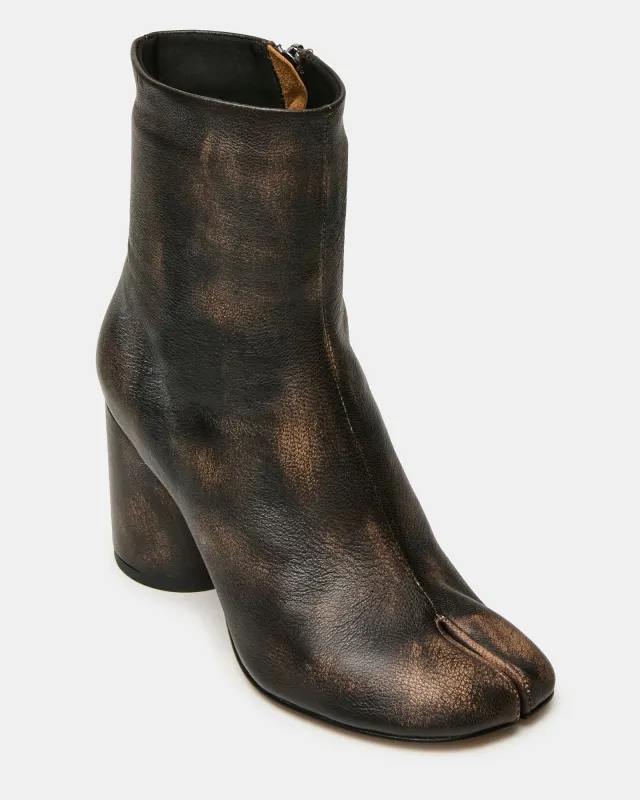 CARO BROWN DISTRESSED sold by Steve Madden