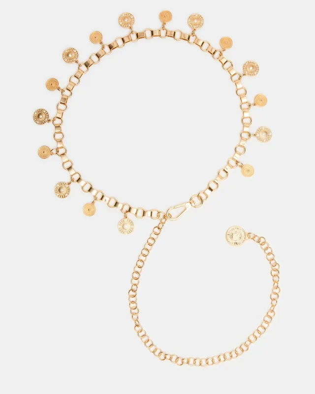 COIN CHAIN BELT GOLD sold by Steve Madden