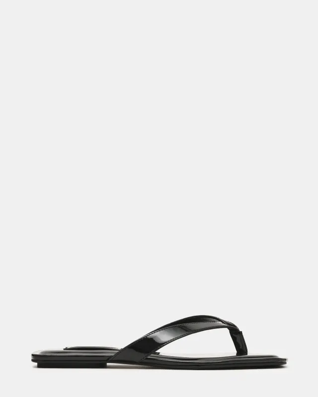 TRELLA BLACK PATENT sold by Steve Madden