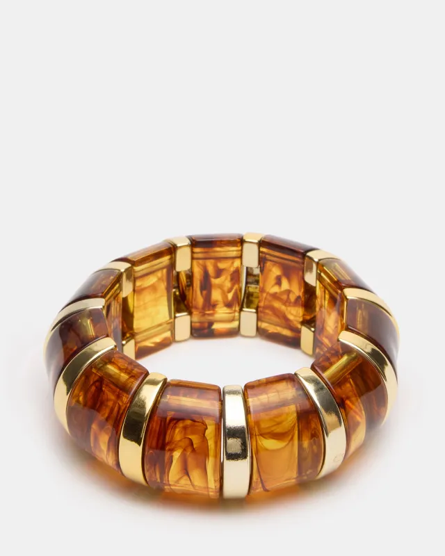 RESIN STRETCH BANGLE BRACELET BROWN made by Steve Madden