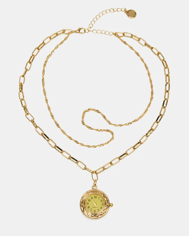 WATCH PENDANT NECKLACE GOLD made by Steve Madden