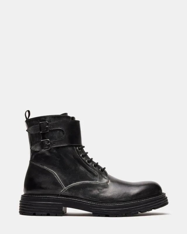 LUCIANO BLACK LEATHER sold by Steve Madden
