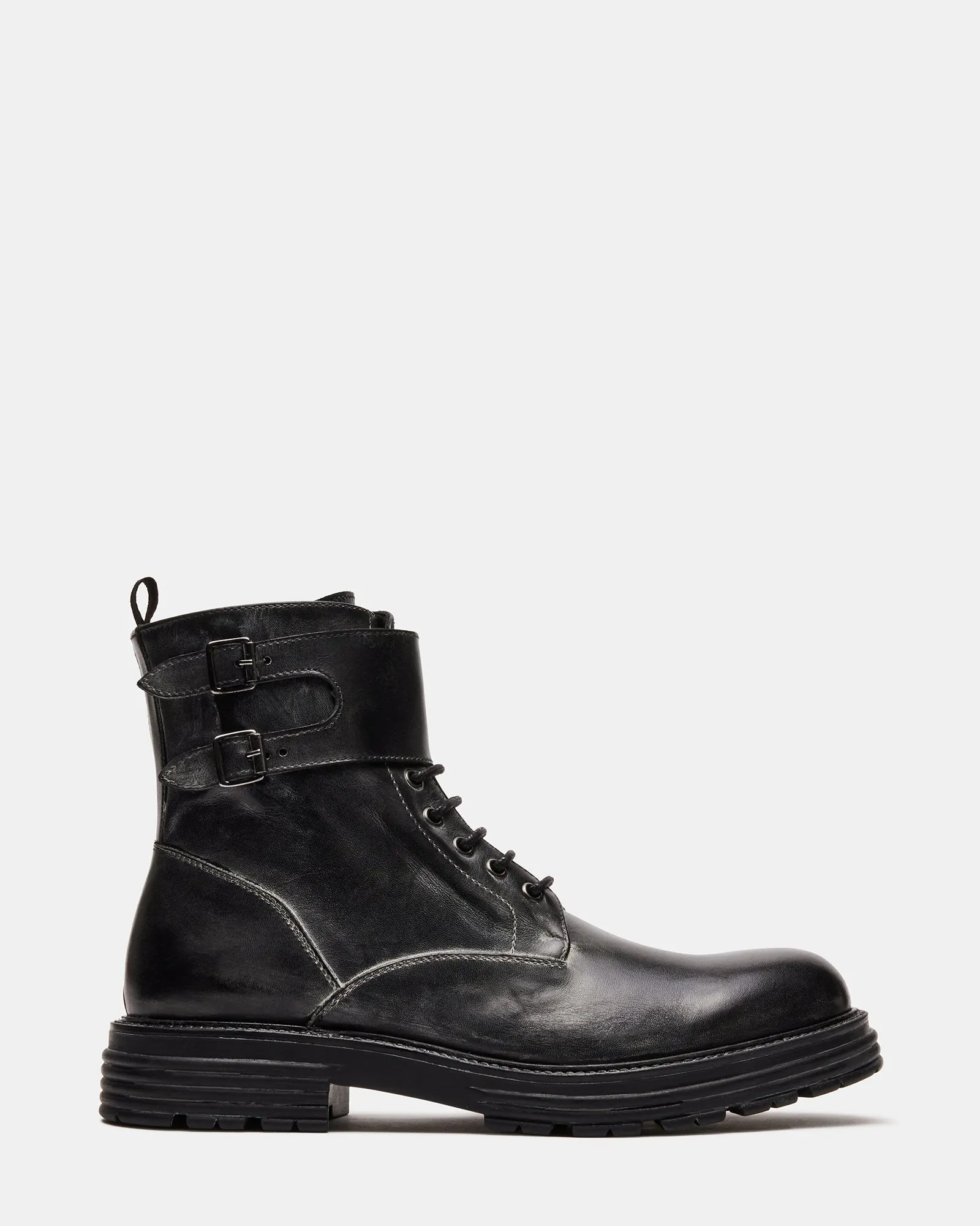 LUCIANO BLACK LEATHER sold by Steve Madden