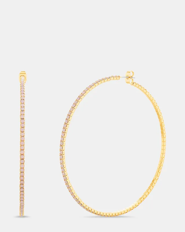 CRYSTAL HOOPS PINK sold by Steve Madden