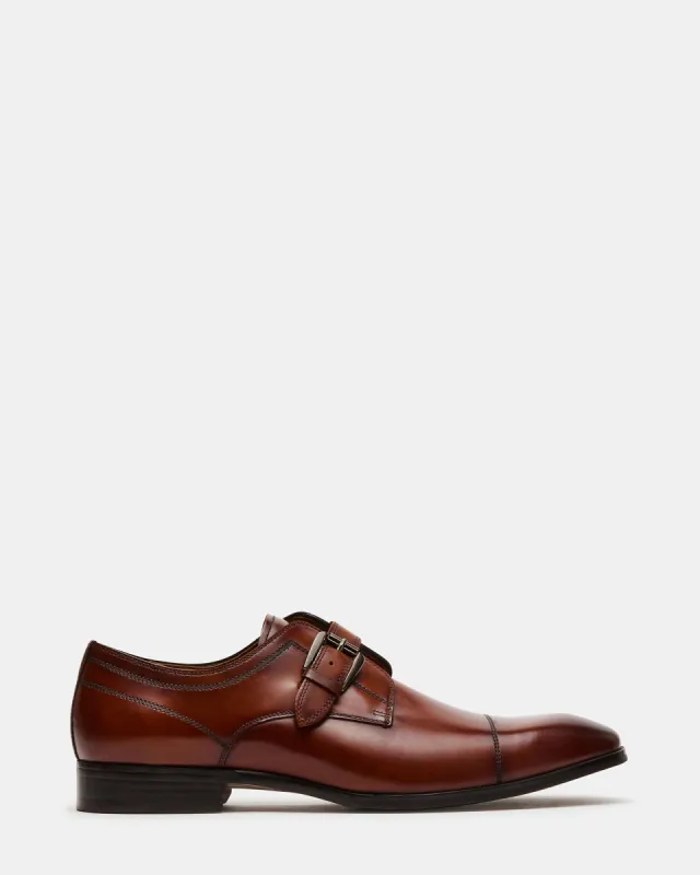 COVET COGNAC LEATHER sold by Steve Madden