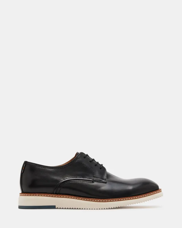 KOLEMAN BLACK LEATHER sold by Steve Madden