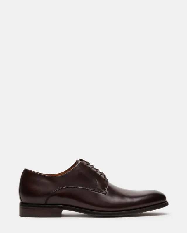 DAYMIN BROWN LEATHER sold by Steve Madden