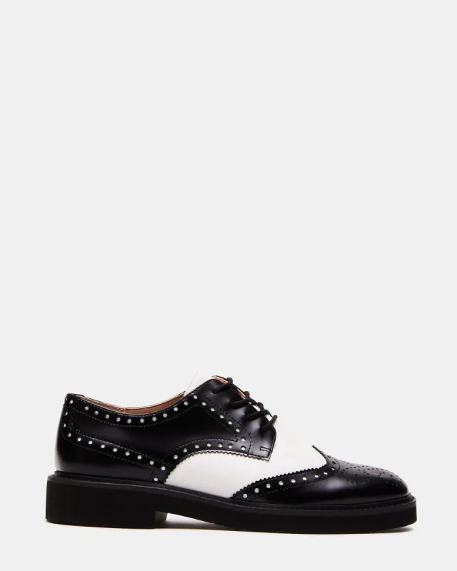 FREDDY BLACK/WHITE - SM REBOOTED sold by Steve Madden