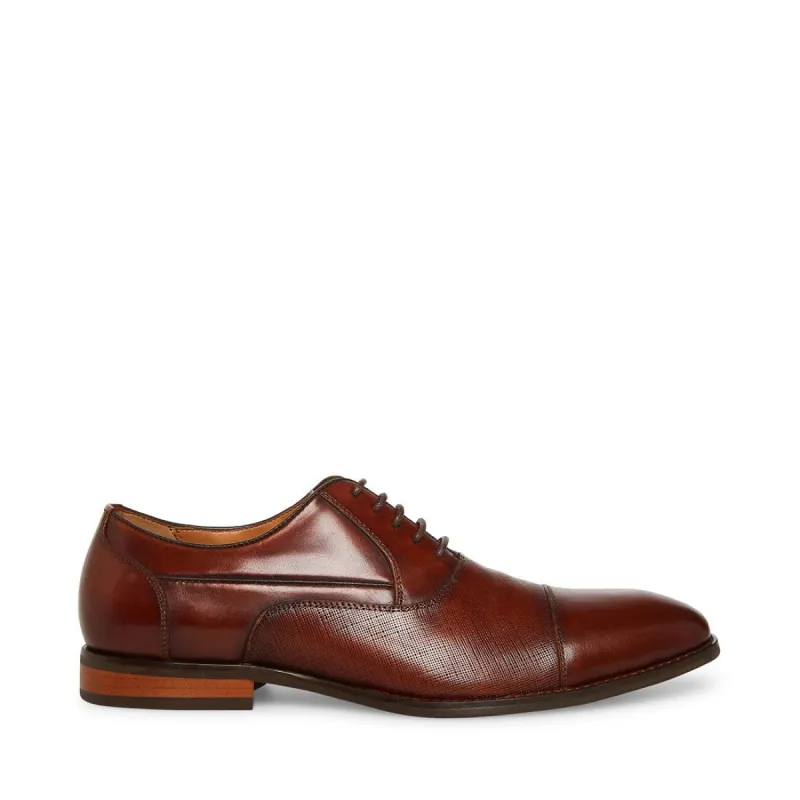PROCTOR-R COGNAC LEATHER sold by Steve Madden