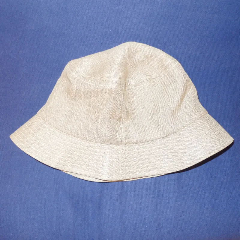 Linen Herringbone Bucket Hat sold by Steven Alan